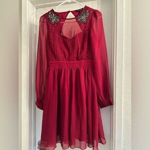 Long sleeved red knee length dress size 4